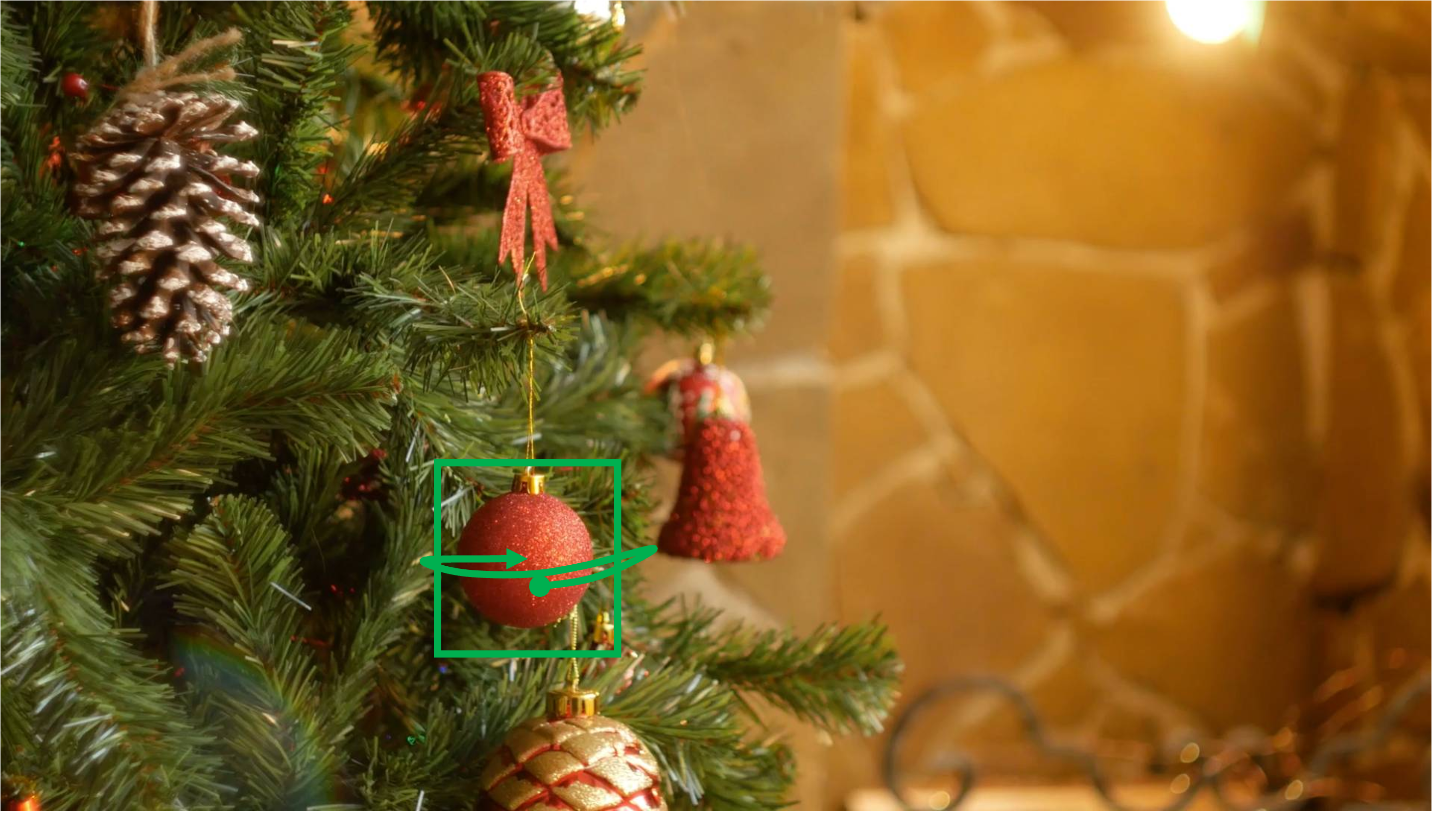 A close-up of a well-decorated Christmas tree. One of the decorative balls is oscillating left and right. The background remains completely static, with no flickering. Camera remains stationary. Static Camera. Camera locked down at the same place. The video loops back to the beginning of the video after it reaches the end.