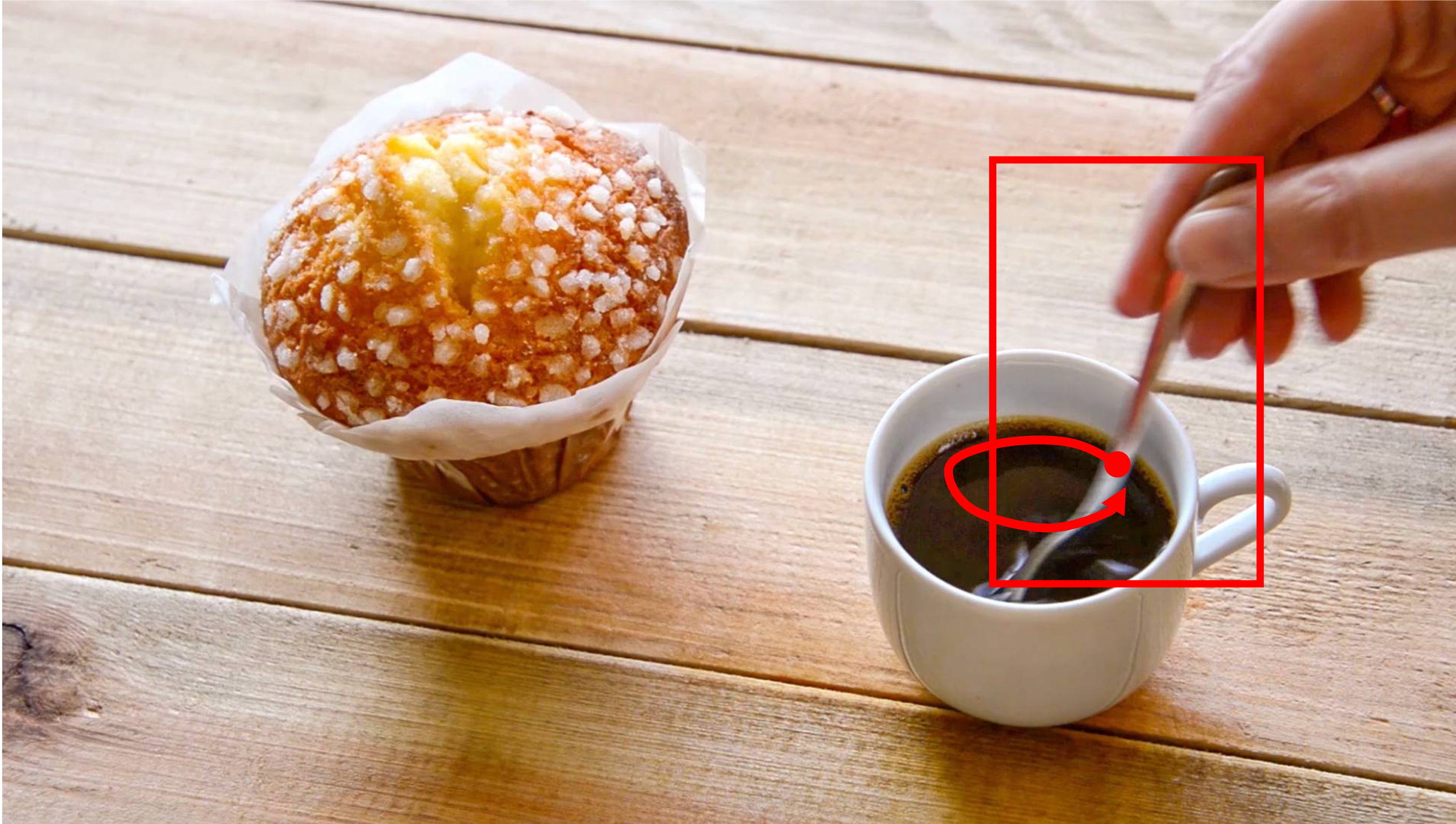 A close-up shot of a woman stirring her coffee with a spoon. The spoon remains submerged in the coffee. The shot is taken with a static camera. Camera remains stationary. Static Camera. Camera locked down at the same place. The video loops back to the beginning of the video after it reaches the end.