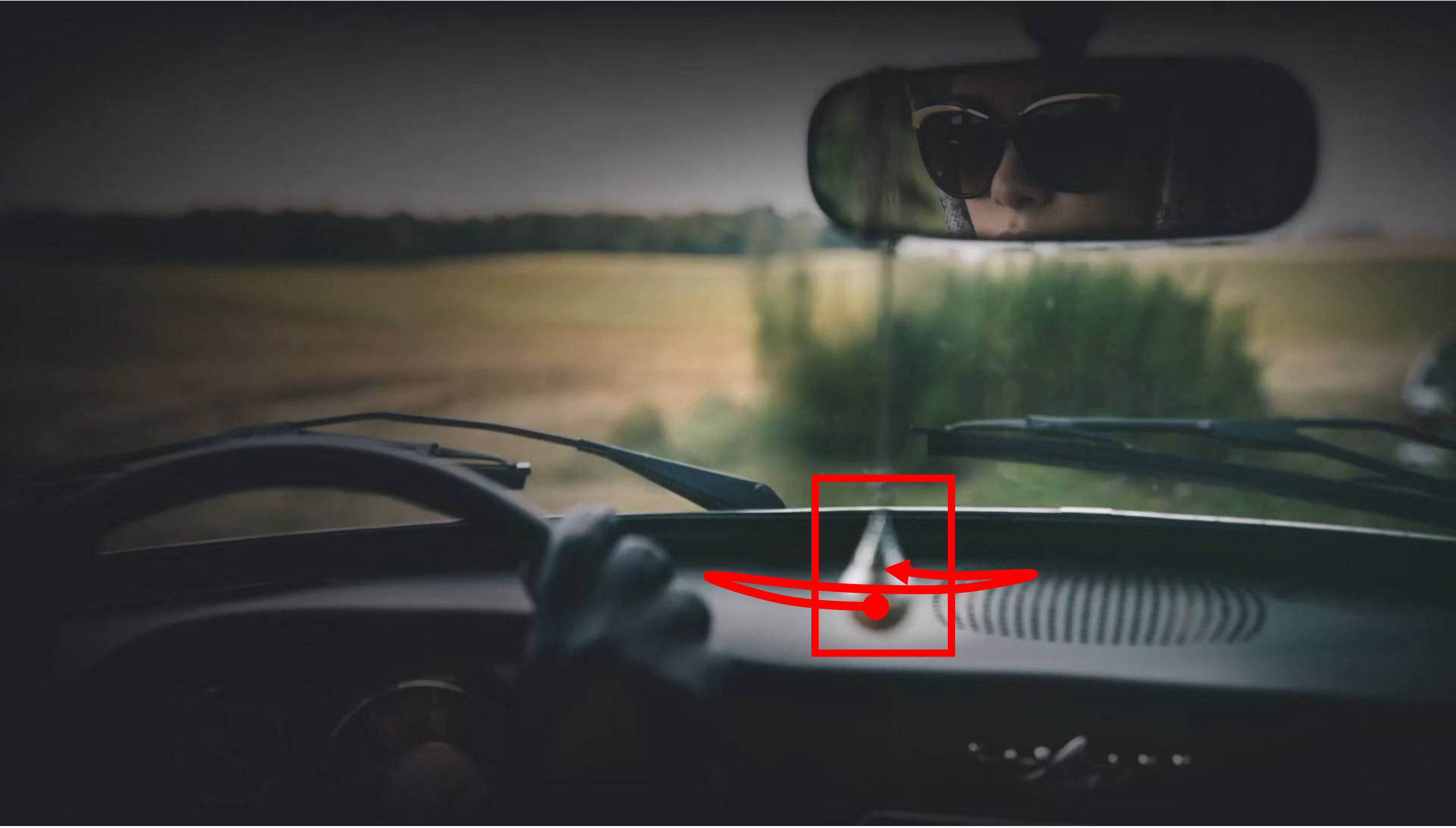 A pendulum is oscillating in a car hanging from the rear-view mirror with a thread. Everything else in the scene is completely static. The shot is taken with a static camera. Camera remains stationary. Static Camera. Camera locked down at the same place. The video loops back to the beginning of the video after it reaches the end.